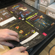 Game slipcovers are stored in artwork portfolios.